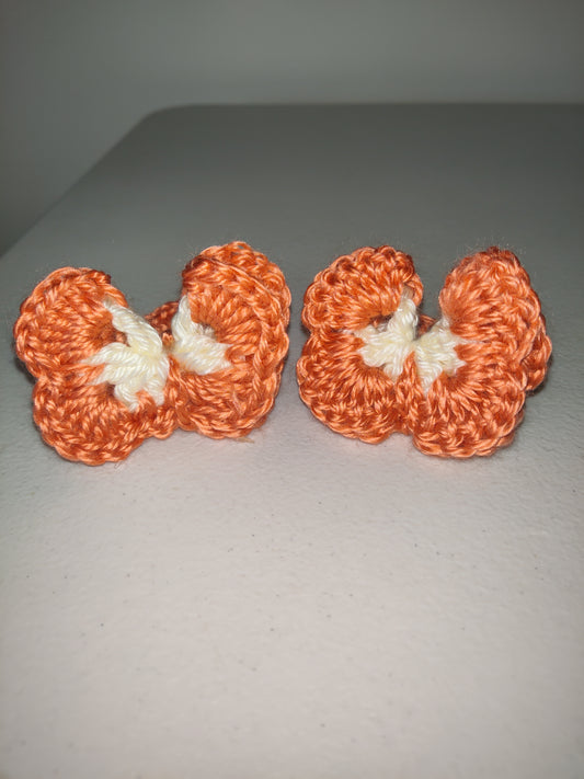 Soporte para cola de caballo con forma de mariposa tejido a mano