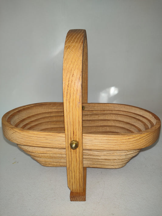 Cesta plegable ovalada de madera con asa