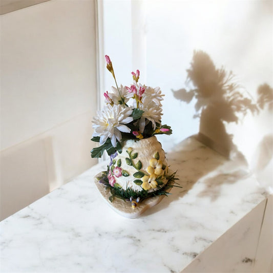 Arreglo floral en tarro de miel hecho a mano