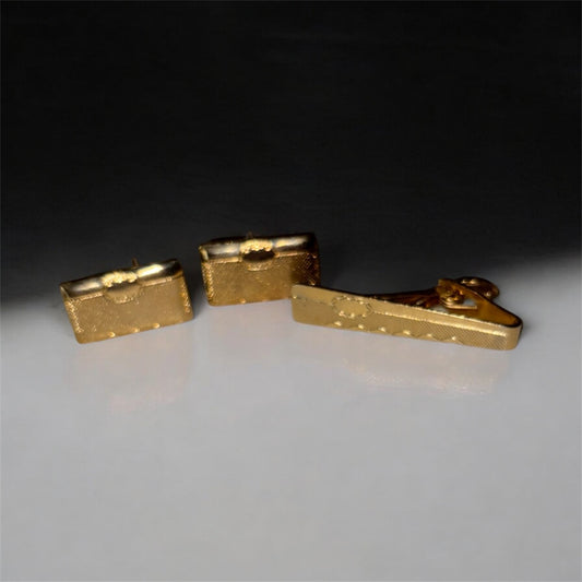 Gemelos y alfiler de corbata vintage en tono dorado
