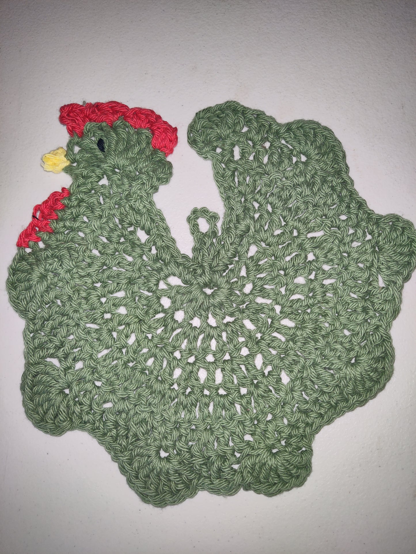 Dos agarraderas de pollo hechas a mano