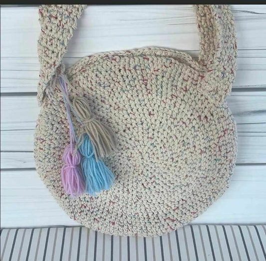 Bolso de mano bohemio redondo de crochet